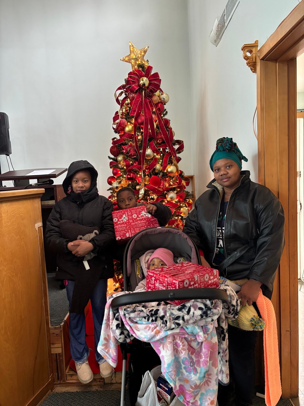 A Christmas gathering with gifts and care