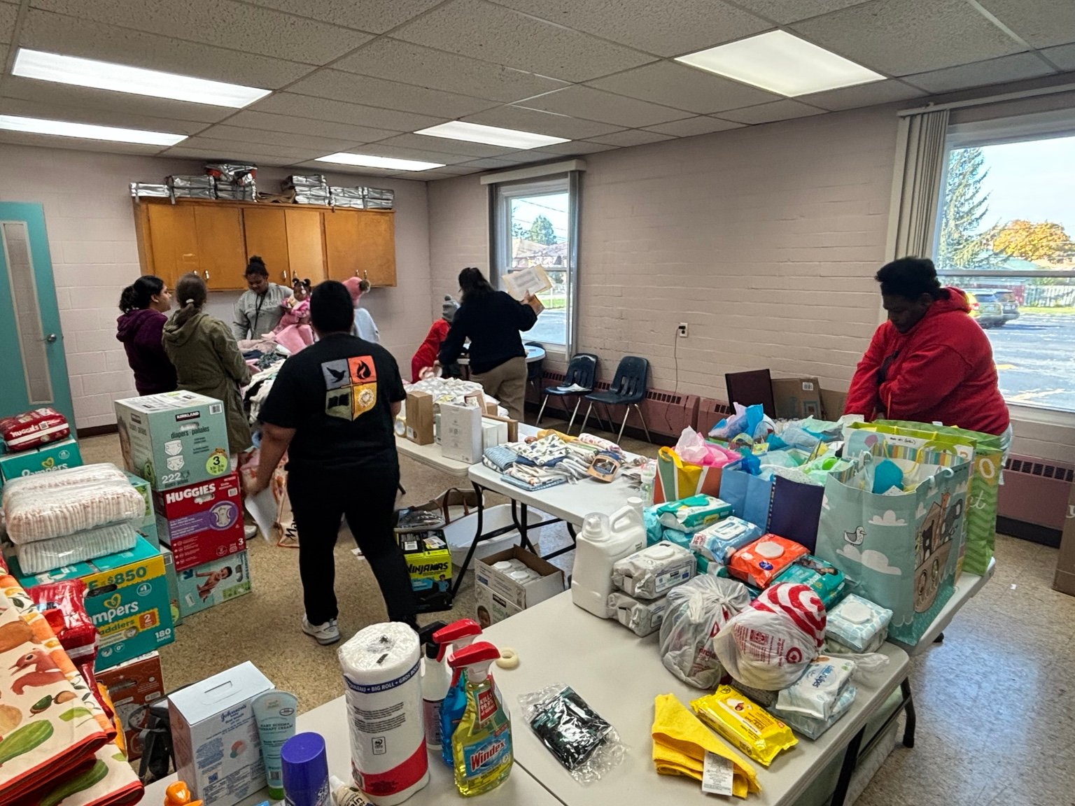 Diapers, baby items, and practical family support